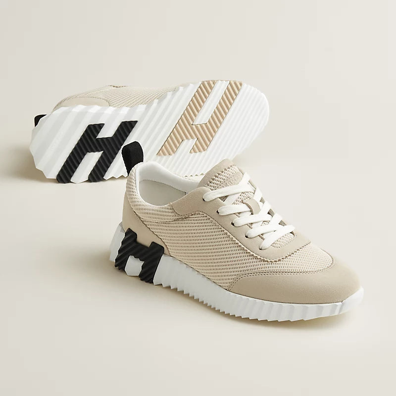 HERMES BOUNCING SNEAKER BEIGE WITH BLACK LOGO – authentiek designer item, direct leverbaar bij Mivelia